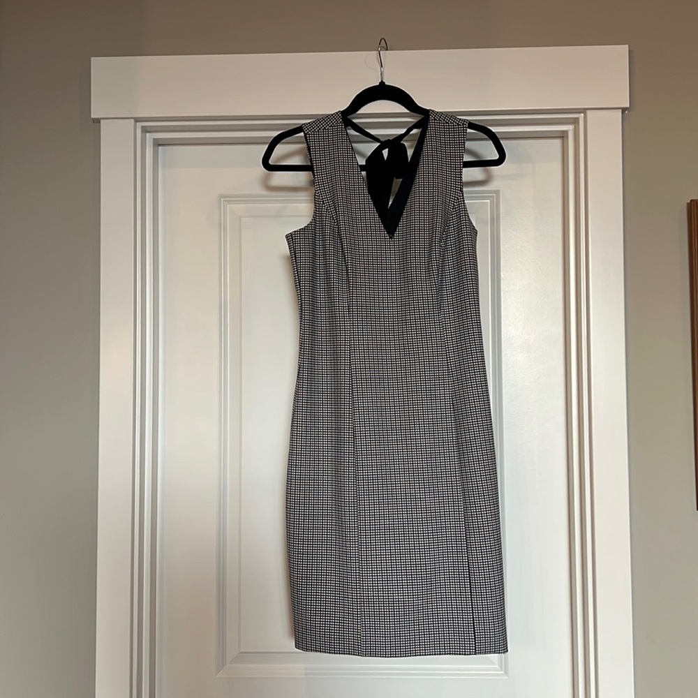 Dress size 4 banana republic , navy, beige, blue with side zip and black tie.